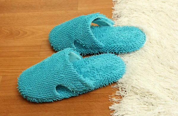 Bright slippers, on floor background — Stock Photo, Image