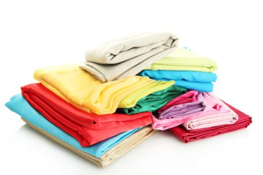 Beyaz kumaş yığınları izole edilmiş.