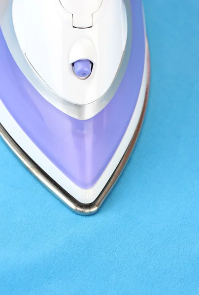 Ironing color textile, close up — Stock Photo, Image