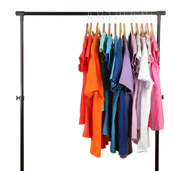 Choice of clothes of different colors on wooden hangers, isolated on white — Stock Photo, Image