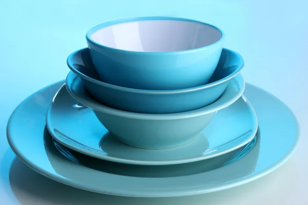 Blue tableware on blue background — Stock Photo, Image