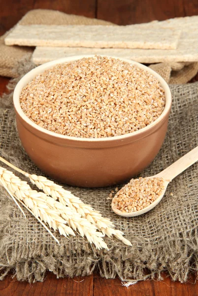 Wheat bran on the table — Stock Photo, Image