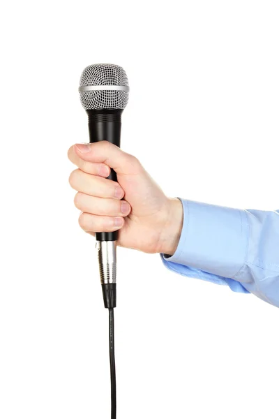 Mano masculina con micrófono aislado en blanco — Foto de Stock
