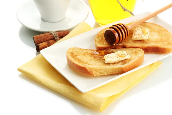 Wit brood toast met honing en kopje koffie, geïsoleerd op wit — Stockfoto