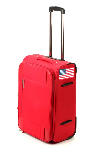 Red suitcase with sticker with flag of USA isolated on white — Stock Photo, Image