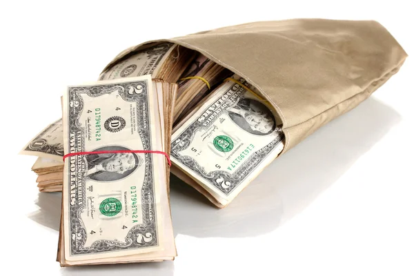 Bag with stacks of dollars isolated on white — Stock Photo, Image