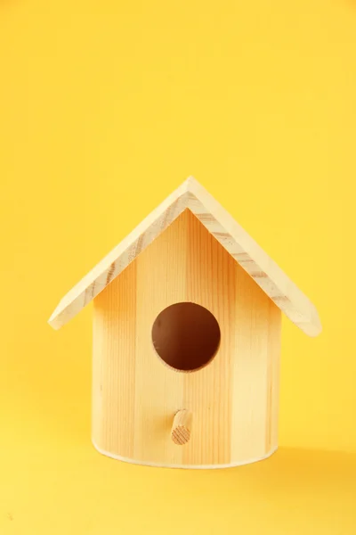 Nesting box on color background — Stock Photo, Image