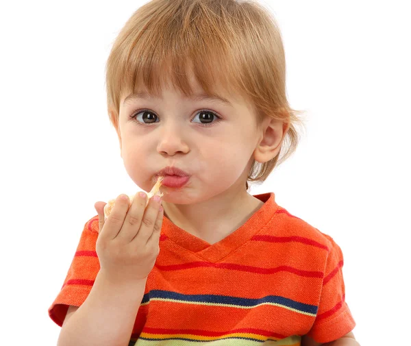 Cute little boy eating tangerine, isolated on white — Stock Photo, Image