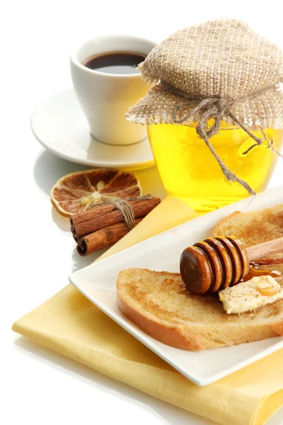 White bread toast with honey and cup of coffee, isolated on white — Stock Photo, Image