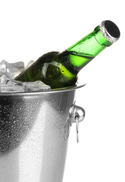 Beer bottle in ice bucket isolated on white — Stock Photo, Image