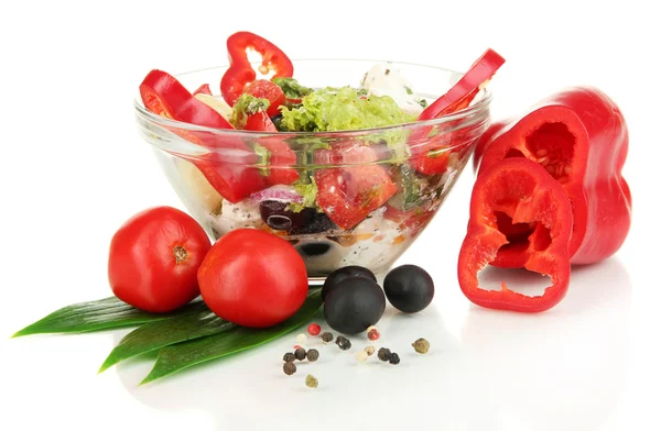 Fresh greek salad in glass bowl isolated on white — Stockfoto