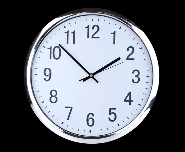 Round office clock on black background — Stock Photo, Image