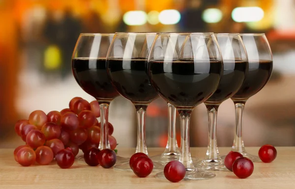 Red wine in glass on room background — Stock Photo, Image