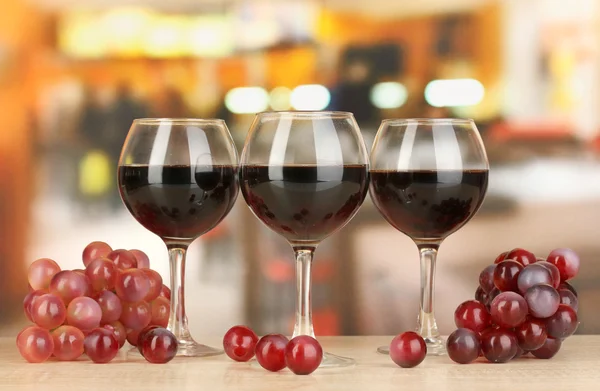 Red wine in glass on room background — Stock Photo, Image