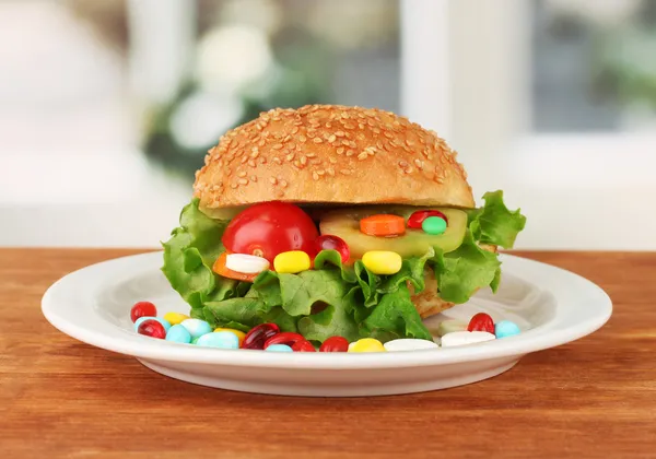 Conceptual image for nutritional care: assorted vitamins and nutritional supplements in bun.On bright background — Stock Photo, Image