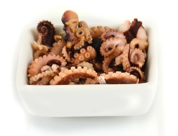 Tentacles of octopus in bowl isolated on white — Stock Photo, Image