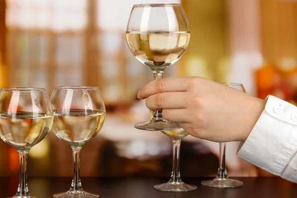 Tasting white wine on room background — Stock Photo, Image