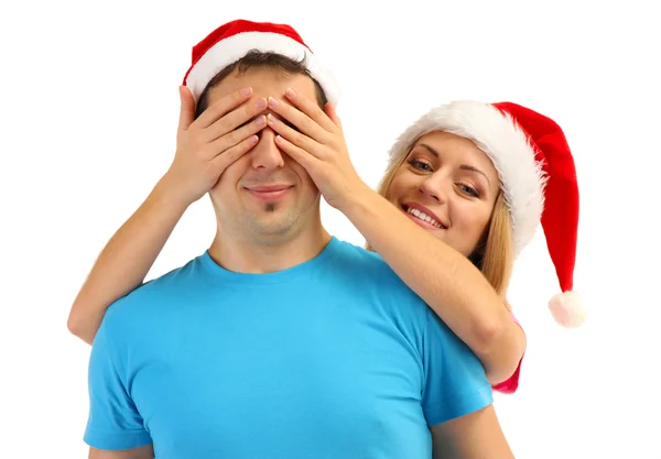 Casal amoroso em chapéus de Papai Noel isolado em branco — Fotografia de Stock