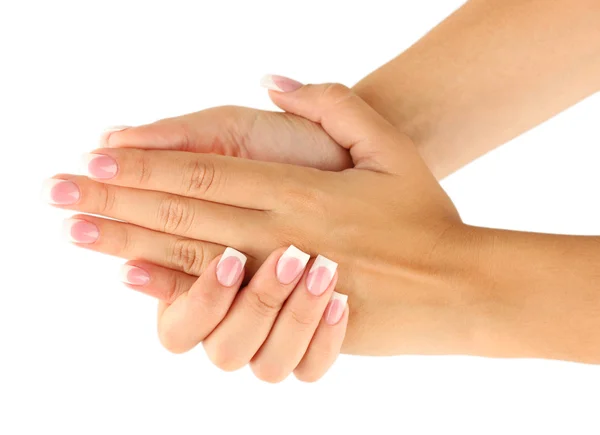 Mãos de mulher bonita com manicure francês no fundo branco — Fotografia de Stock