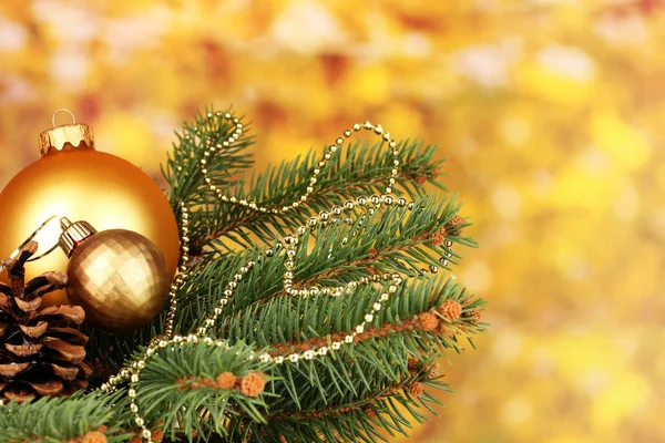 Christmas decoration on yellow background — Stock Photo, Image