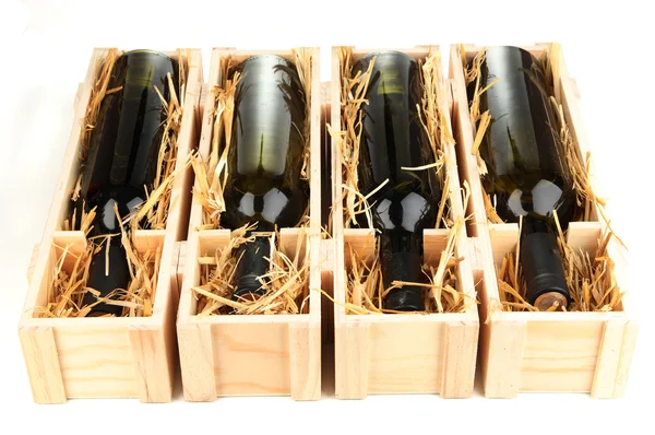 Wooden case with wine bottles isolated on white — Stock Photo, Image