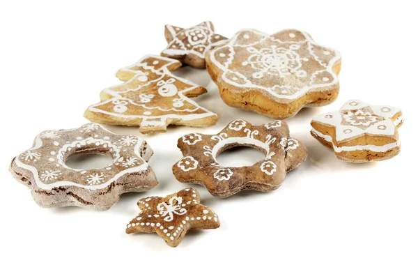 Many Christmas cookies isolated on white — Stock Photo, Image