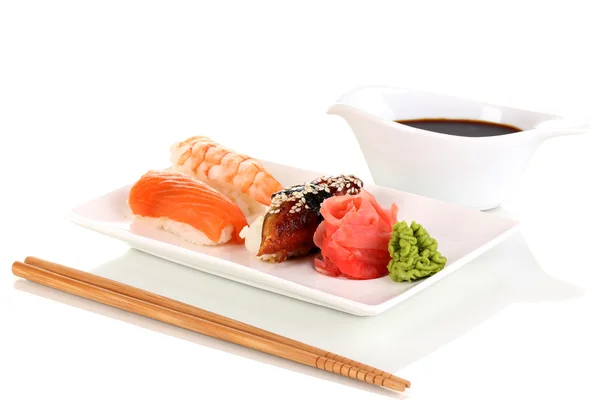 Delicious sushi served on plate isolated on white — Stock Photo, Image