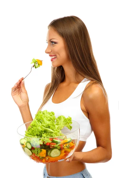 Bella giovane donna con insalata, isolata su bianco — Foto Stock