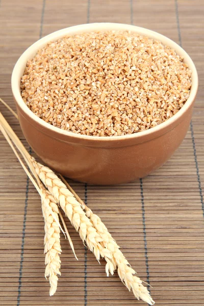 Brown bowl full of wheat bran — Stock Photo, Image