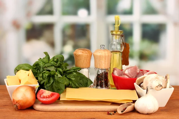 Lasagna ingredients on bright background — Stock Photo, Image