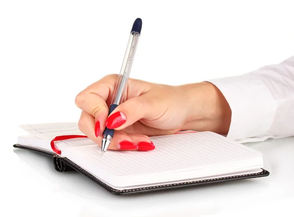 Hand signing in notebook isolated on white — Stock Photo, Image