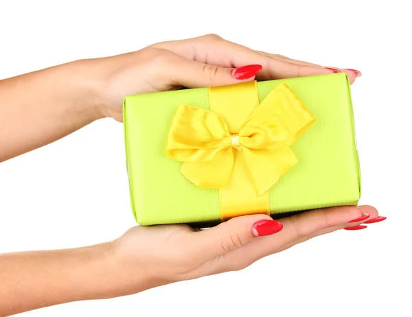 Woman holds box with gift on white background close-up — Stockfoto