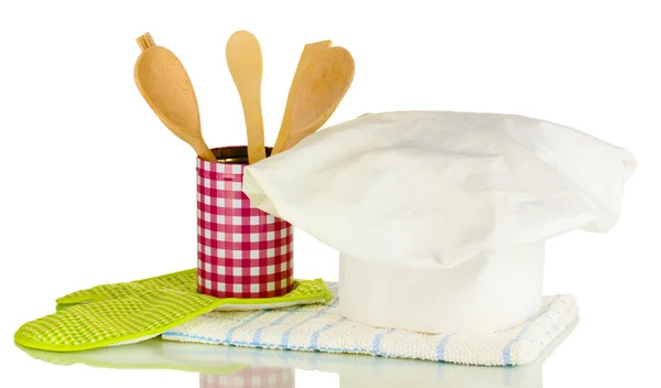 Chef's hat with kitchen towels, potholders and kitchenware isolated on white — Stock Photo, Image
