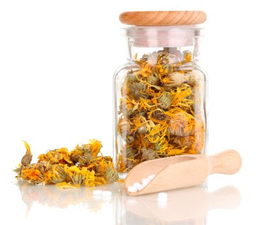 tabletten en fles met kruiden geïsoleerd op wit