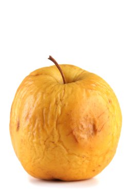 Manzana amarilla como concepto de piel problema, aislado en blanco