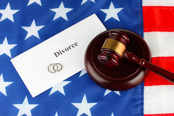 Divorce decree and wooden gavel on american flag background — Stock Photo, Image