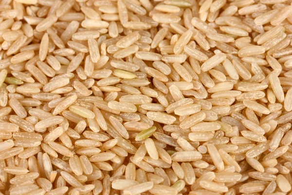 Фон коричневий рис — стокове фото