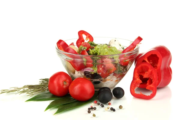 Fresh greek salad in glass bowl isolated on white — Stockfoto