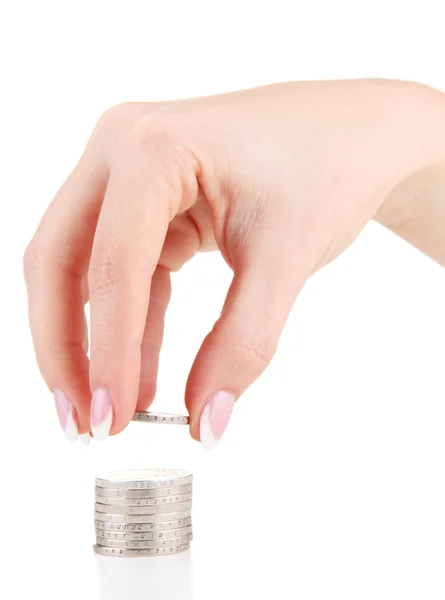 Mano de mujer con monedas, aislada en blanco — Foto de Stock