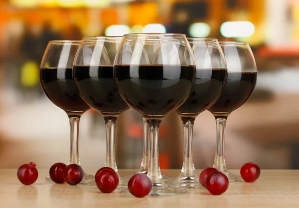 Red wine in glass on room background — Stock Photo, Image