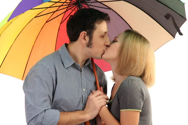 Casal amoroso com guarda-chuva isolado no branco — Fotografia de Stock
