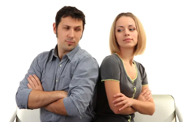 Young couple turning away from each other isolated on white — Stock Photo, Image