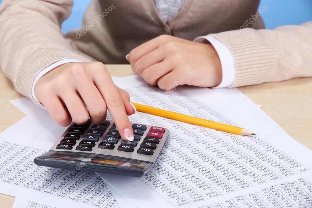 Closeup of businesswoman hands, working in office room