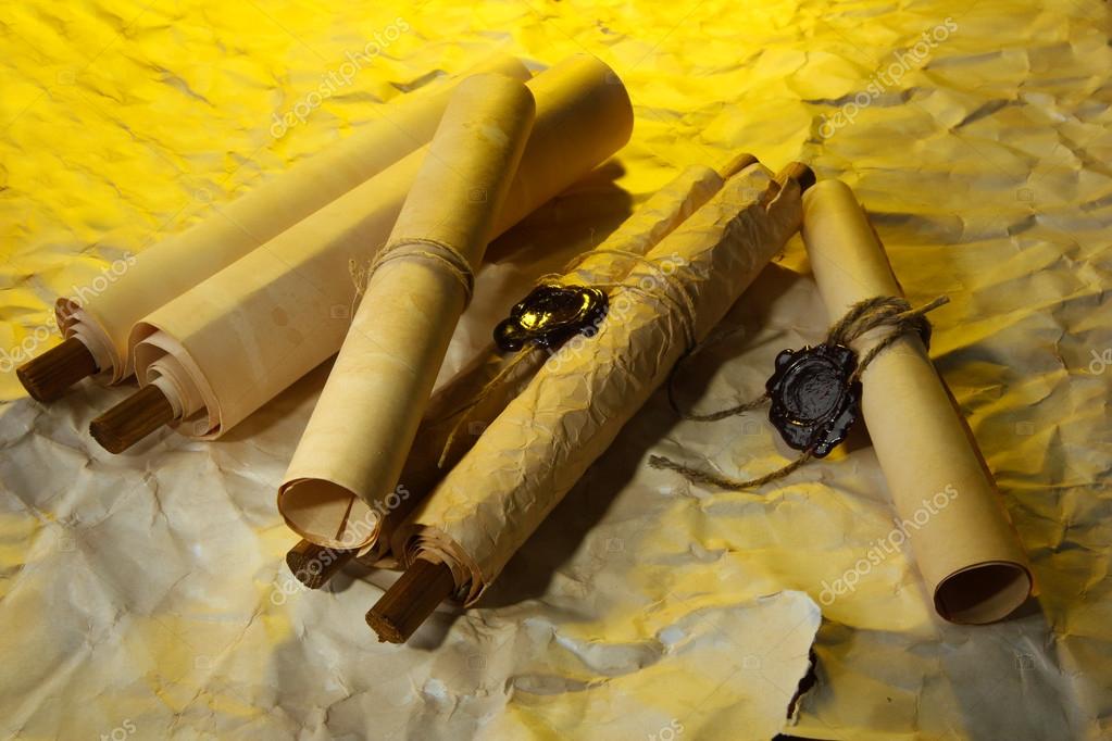 Old scrolls, on brown paper background Stock Photo by ©belchonock 18294461