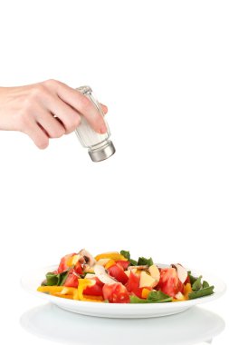 el ekleyerek tuz tuz shaker üzerinde beyaz izole kullanarak