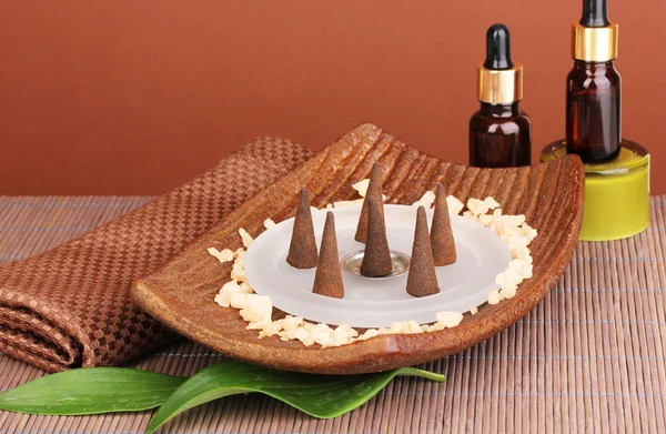 Aromatherapy setting on brown background Stock Picture