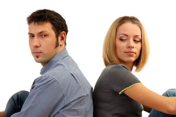 Young couple turning away from each other isolated on white — Stock Photo, Image