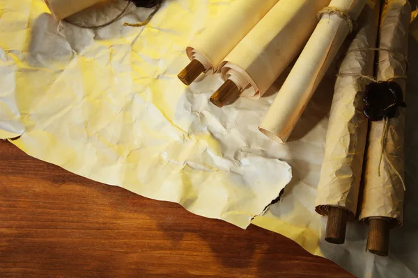 Old scrolls, on brown paper background — Stock Photo, Image