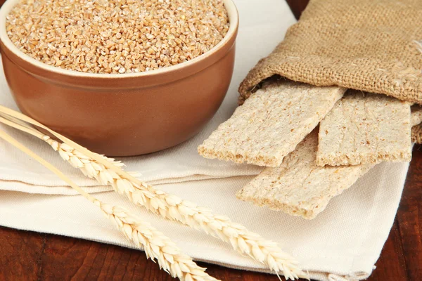 Wheat bran on the table — Stock Photo, Image