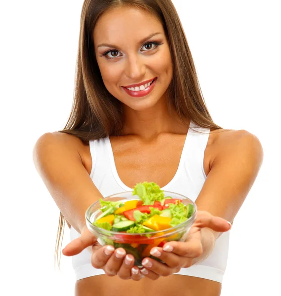 Красивая молодая женщина с салатом, изолированные на белом — стоковое фото